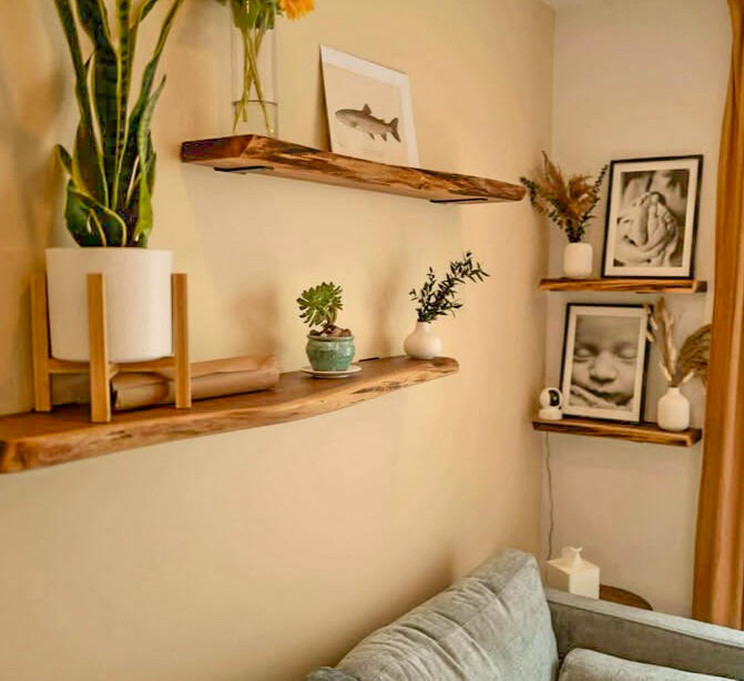 Walnut shelves above a couch