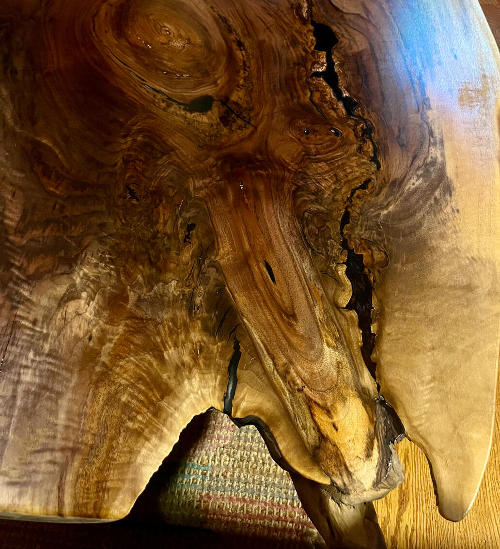 Black walnut table detail with resin